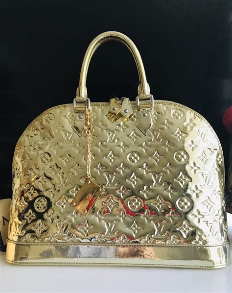 louis vuitton bag with gold plate|louis vuitton over shoulder bag.